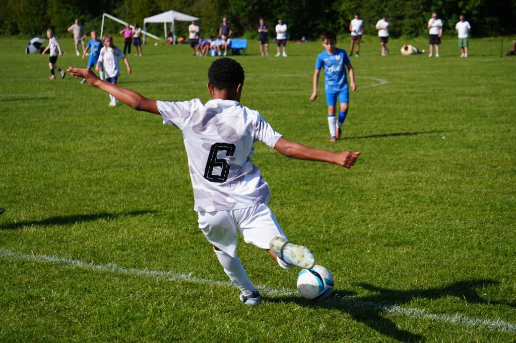 Player striking the ball during a match